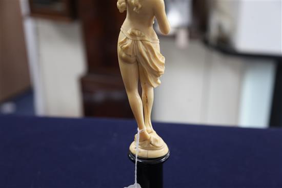 A 19th century French Dieppe ivory carving of Venus and Cupid, Overall H.13.25in.